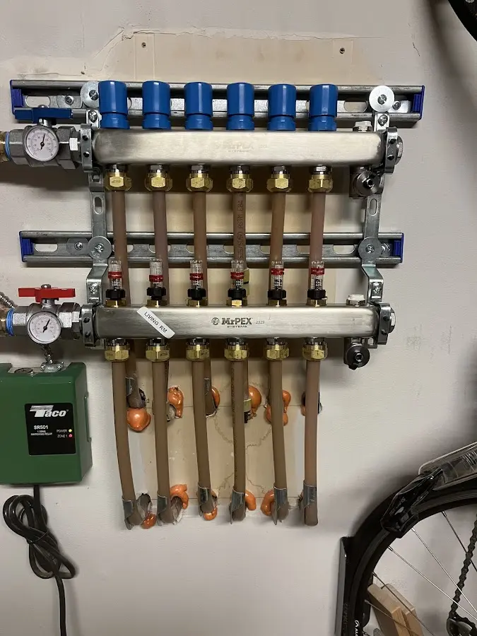 Plumber performing Water Heater Repair at a residential property in Shorewood